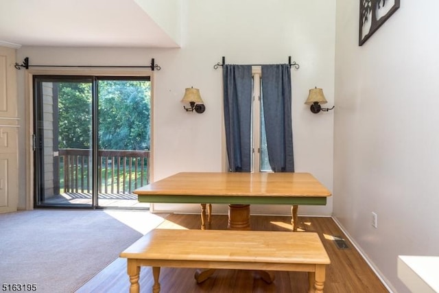 view of carpeted dining area