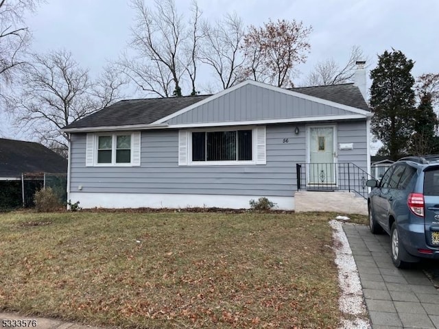 view of front of home with a front yard