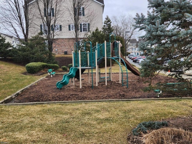 view of jungle gym featuring a yard