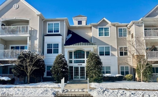 view of snow covered building