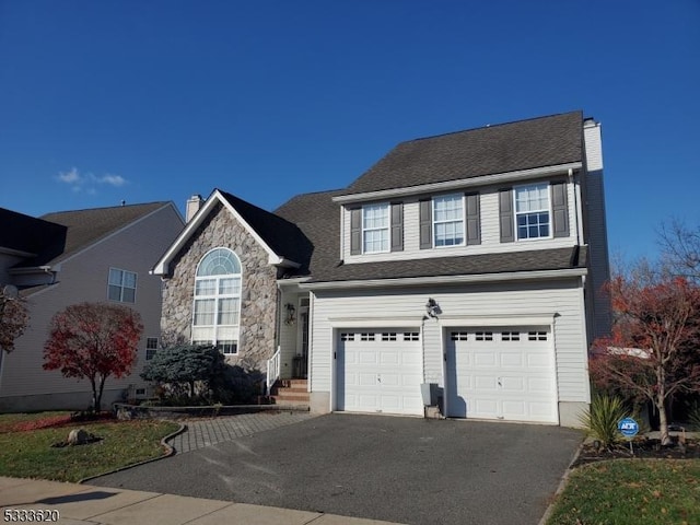 view of front of home featuring a garage