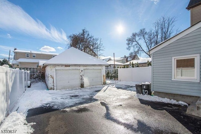 view of snow covered garage