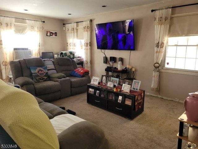 carpeted living room featuring a wealth of natural light