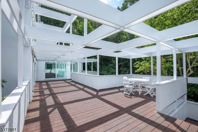 unfurnished sunroom with plenty of natural light