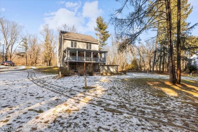 view of snow covered property