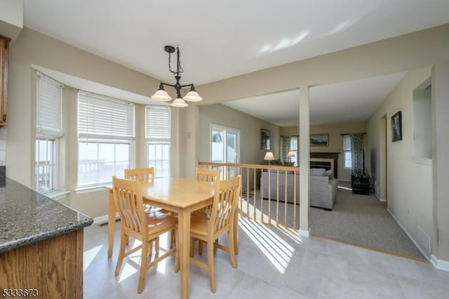 view of carpeted dining area