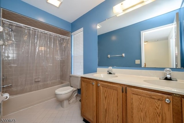 full bathroom featuring vanity, shower / tub combo with curtain, tile patterned floors, and toilet