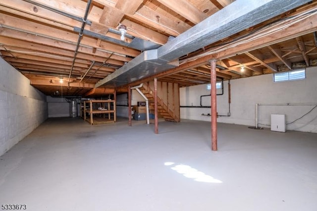 basement featuring water heater