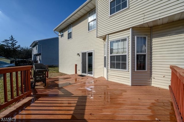 deck featuring grilling area