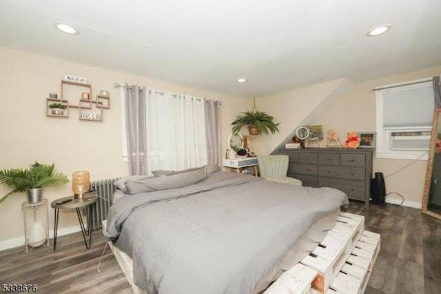 bedroom with recessed lighting, baseboards, and wood finished floors