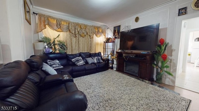 living room with ornamental molding