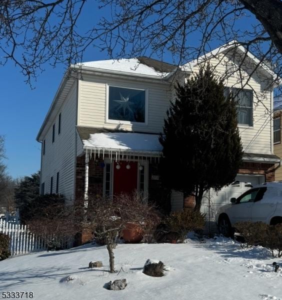 view of property with a garage