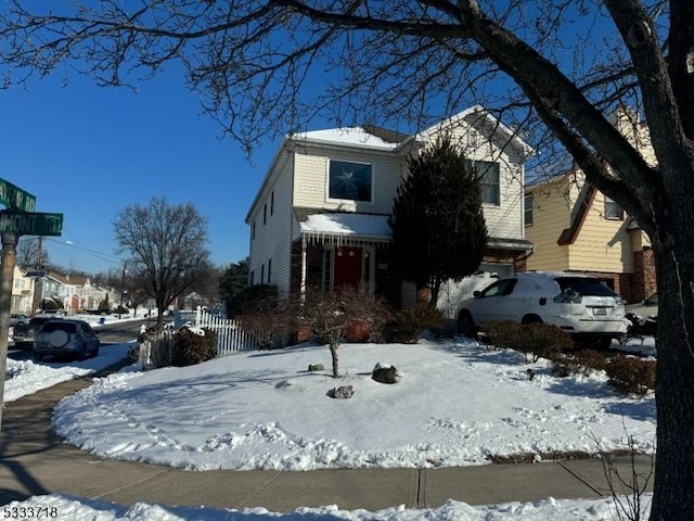 view of front of property with fence