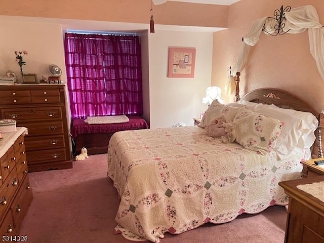 bedroom featuring carpet