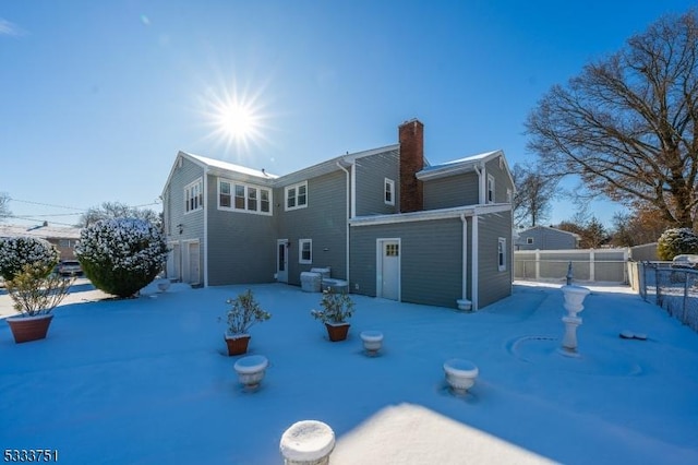 view of snow covered house