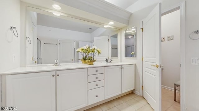 bathroom featuring vanity and tile patterned floors