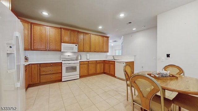 kitchen with white appliances and sink