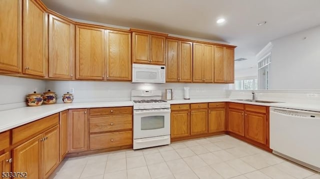 kitchen with sink and white appliances