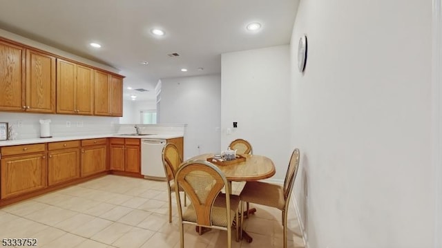 kitchen featuring sink and white dishwasher