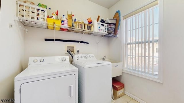 laundry room with washer and dryer