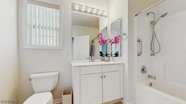 full bathroom with vanity, tub / shower combination, and toilet