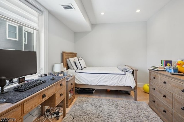 bedroom with light wood-type flooring