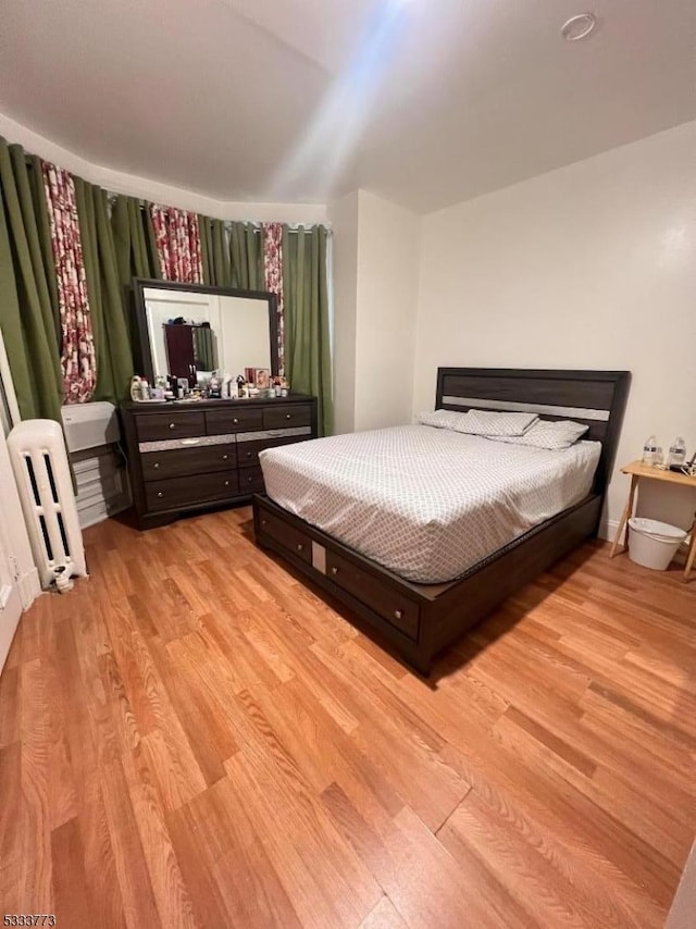 bedroom featuring light hardwood / wood-style flooring