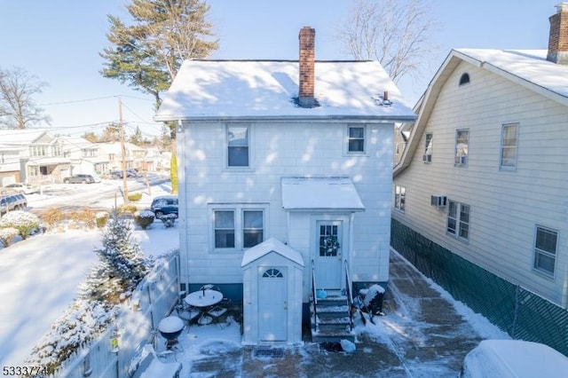 view of snow covered property