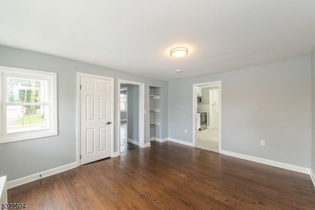 interior space featuring dark wood-type flooring