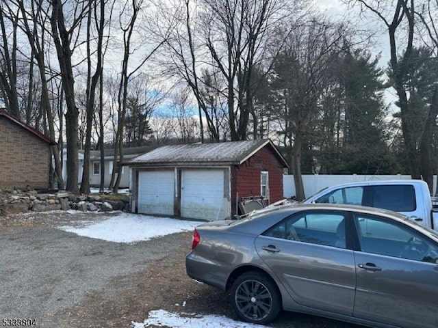 view of snow covered garage