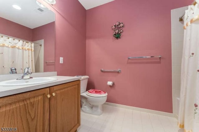 full bath with toilet, shower / tub combo, baseboards, and vanity