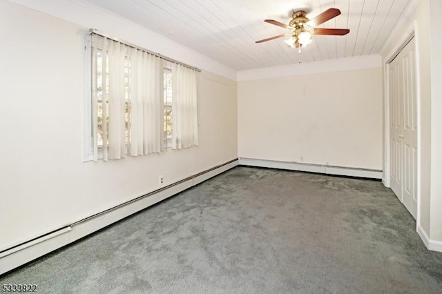 unfurnished room featuring a baseboard heating unit, wood ceiling, ceiling fan, and carpet