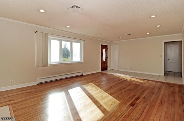 interior space with a baseboard radiator, ornamental molding, and light wood-type flooring