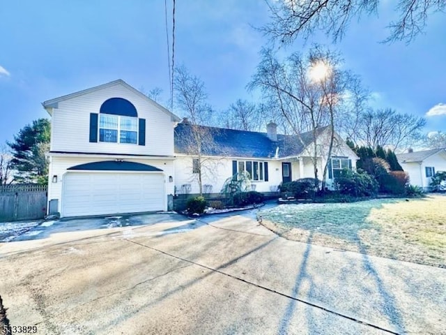 view of front of property with a garage