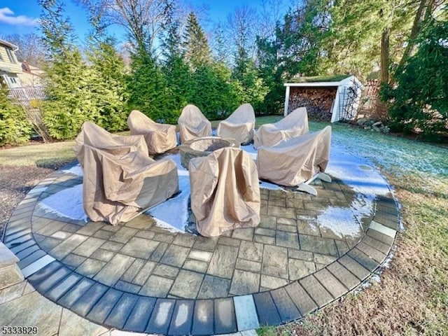 view of pool featuring a shed