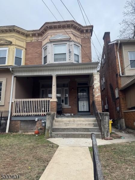 view of front of house featuring covered porch