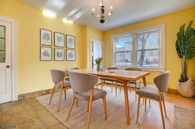 dining space featuring a notable chandelier