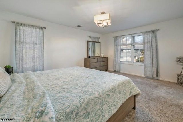 bedroom featuring carpet