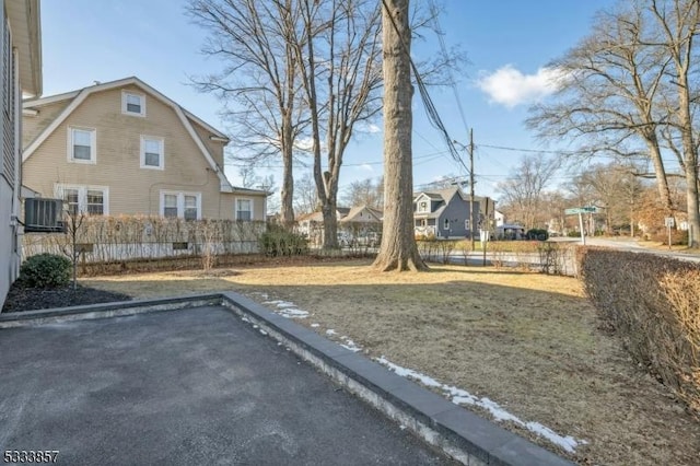 view of yard featuring central AC