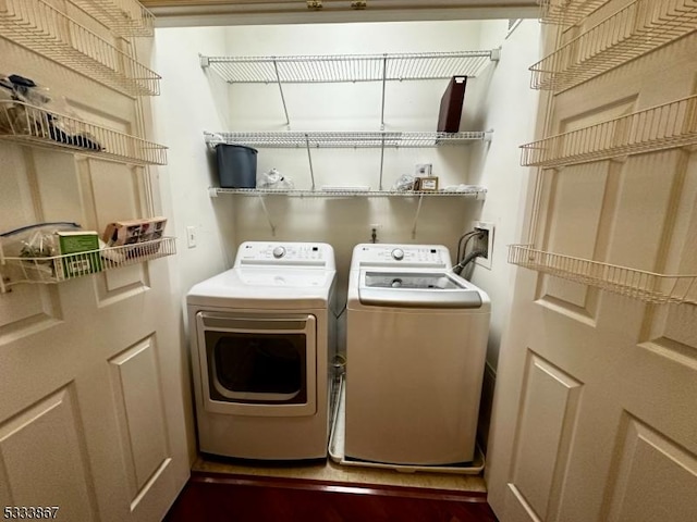 laundry area featuring independent washer and dryer