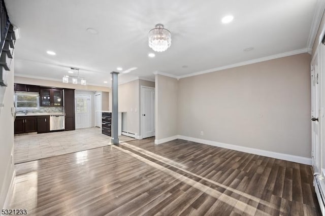 unfurnished living room featuring a baseboard heating unit, crown molding, and dark wood-type flooring