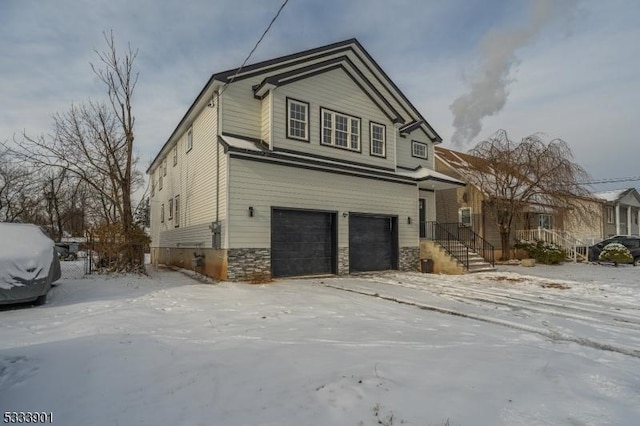 view of front of property featuring a garage