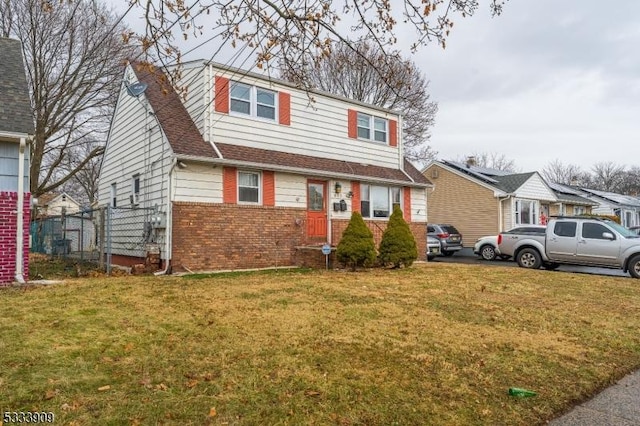 view of front of home featuring a front lawn