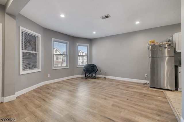 interior space with light hardwood / wood-style floors