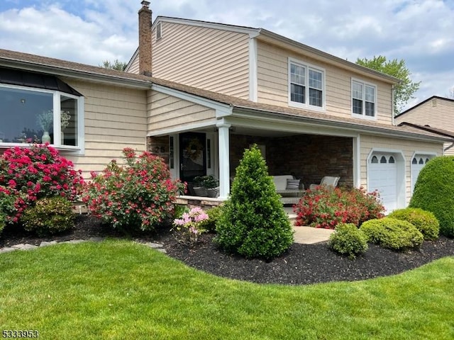 view of front of home featuring a front yard and a chimney