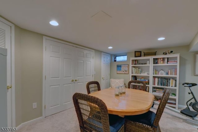 dining area with light carpet, recessed lighting, and baseboards