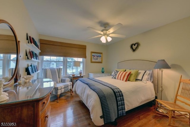 bedroom featuring ceiling fan and wood finished floors