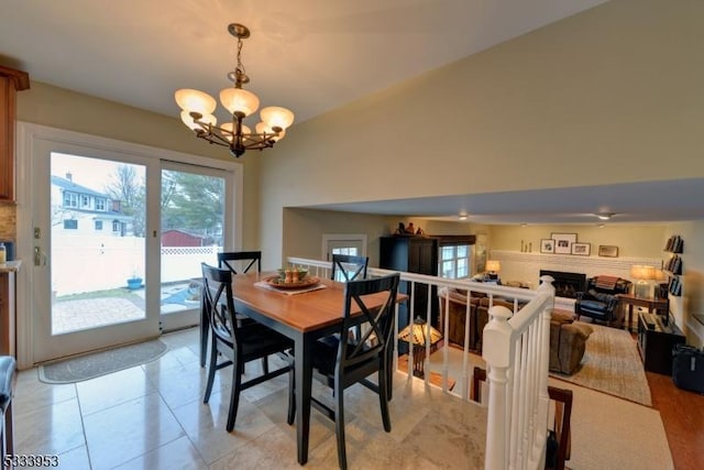 dining space featuring a chandelier and light tile patterned flooring