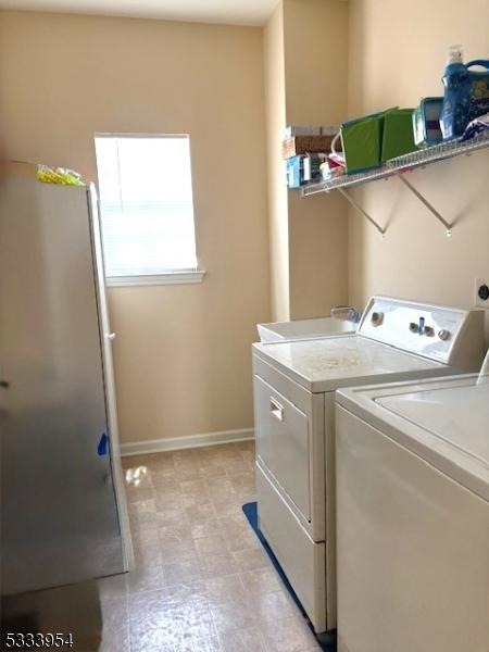 laundry area featuring washer and dryer