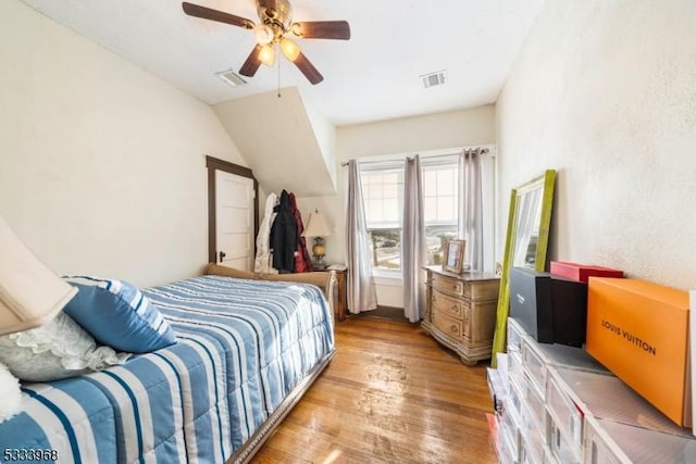 bedroom with light wood-type flooring and ceiling fan